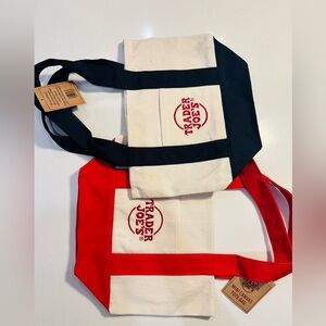Pair of red and blue brand new Trader Joe’s mini totes